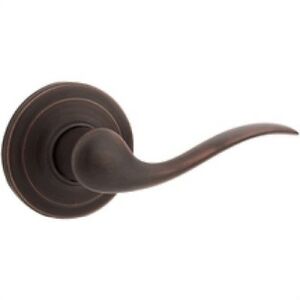 Kwikset Tustin Venetian Bronze Passage Lockset ANSI/BHMA Grade 2 1-3/4 in