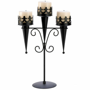 Gallery of Light 15.75 in. H x 4.75 in. W x 11.75 in. L Medieval Iron Decorative Candle Holder.