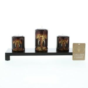 Accent Plus, 4.625 in. H x 3.875 in. W x 11.75 in. L Sage Elephants Metal/Wood Decorative Candle H